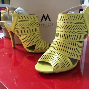 Gently worn yellow open toe heel sandals